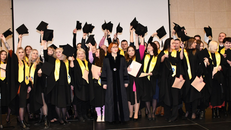 The graduates receive their diplomas